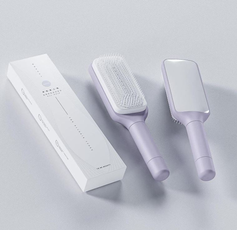 Brosse à cheveux demelante